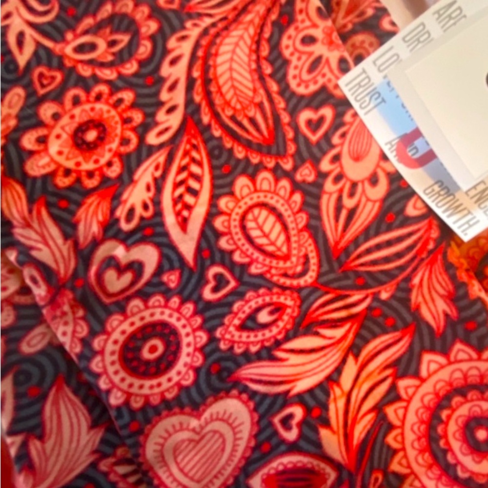 Lularoe leggings with cheery orange paisley